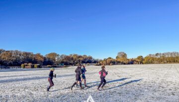 Run the Wild Chilterns Winter 10km Run with runners in snow