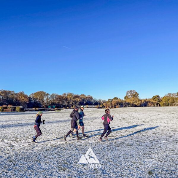 Run the Wild Chilterns Winter 10km Run with runners in snow