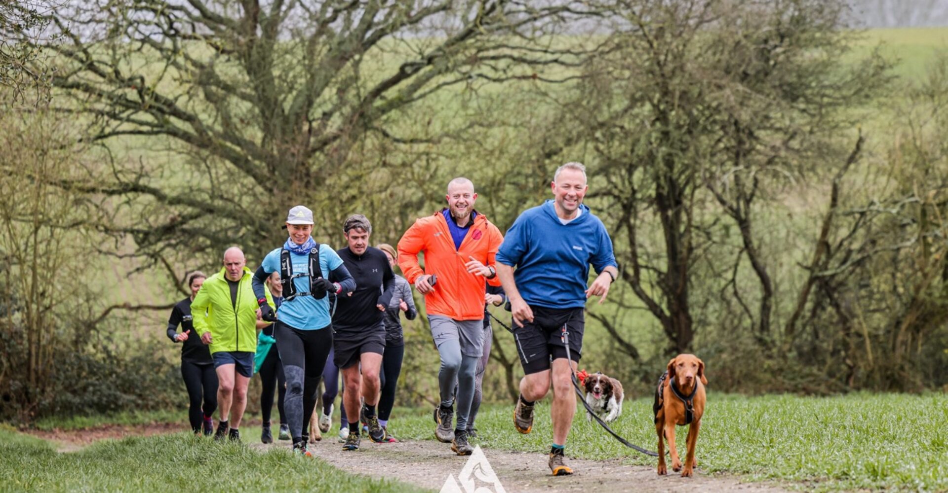 Trail runners running in the Chilterns on the Berko 10km organised by Run the Wild