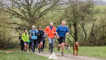 Trail runners running in the Chilterns on the Berko 10km organised by Run the Wild