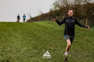 Trail runners running in the Chilterns on the Berko 10km organised by Run the Wild
