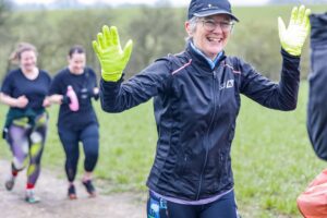 Trail runners running in the Chilterns on the Berko 10km organised by Run the Wild