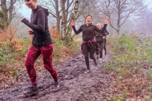 Trail runners running in the Chilterns on the Berko 10km organised by Run the Wild