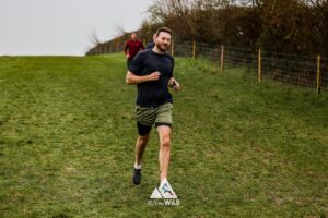 Trail runners running in the Chilterns on the Berko 10km organised by Run the Wild