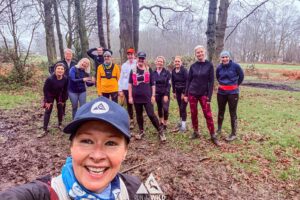 Trail runners running in the Chilterns on the Berko 10km organised by Run the Wild