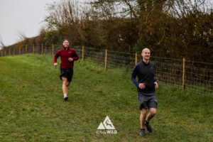 Trail runners running in the Chilterns on the Berko 10km organised by Run the Wild