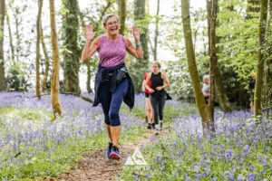 Runners completing the bluebell 10km in Tring with Run the Wild