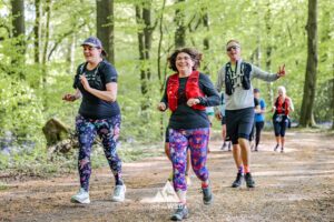 Runners completing the bluebell 10km in Tring with Run the Wild
