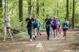 Runners completing the bluebell 10km in Tring with Run the Wild