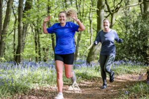Runners completing the bluebell 10km in Tring with Run the Wild