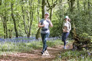 Runners completing the bluebell 10km in Tring with Run the Wild