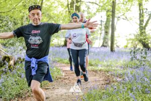 Runners completing the bluebell 10km in Tring with Run the Wild