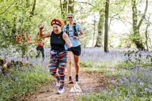 Runners completing the bluebell 10km in Tring with Run the Wild