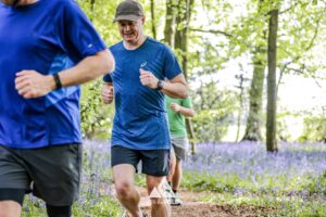 Runners completing the bluebell 10km in Tring with Run the Wild