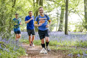 Runners completing the bluebell 10km in Tring with Run the Wild