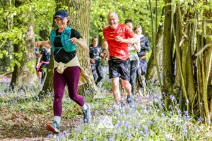 Runners completing the bluebell 10km in Tring with Run the Wild
