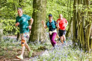 Runners completing the bluebell 10km in Tring with Run the Wild
