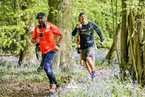 Runners completing the bluebell 10km in Tring with Run the Wild