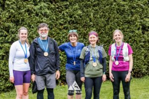 trail runners completing the chilterns trail marathon with run the wild
