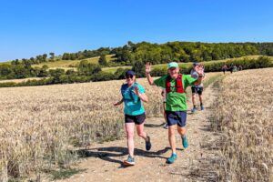 RtW_ChilternsSummer10k_2026-04 runners in the chilterns taking part in the summer 10km trail run