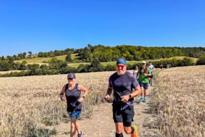 RtW_ChilternsSummer10k_2026-05 runners in the chilterns taking part in the summer 10km trail run