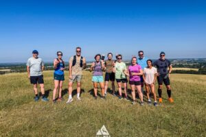 RtW_ChilternsSummer10k_2026-12 runners in the chilterns taking part in the summer 10km trail run