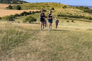 RtW_ChilternsSummer10k_2026-18 runners in the chilterns taking part in the summer 10km trail run