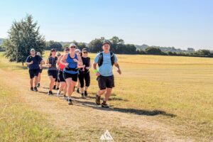 RtW_ChilternsSummer10k_2026-24 runners in the chilterns taking part in the summer 10km trail run