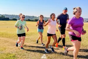 RtW_ChilternsSummer10k_2026-25 runners in the chilterns taking part in the summer 10km trail run