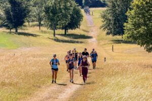 RtW_ChilternsSummer10k_2026-28 runners in the chilterns taking part in the summer 10km trail run