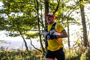 Trail runners completing the Water & Windmill 10 miler in the Chilterns with Run the Wild
