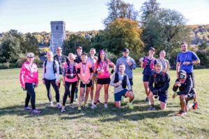 Trail runners completing the Water & Windmill 10 miler in the Chilterns with Run the Wild